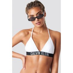 Calvin Klein Góra bikini Fixed Triangle-RP Logo - White. Białe bikini damskie Calvin Klein, z haftami. Za 181.95 zł.