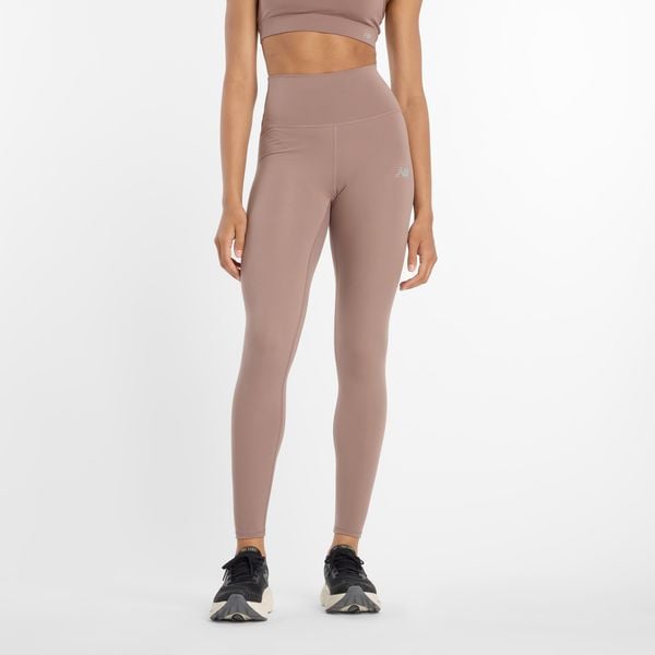 Legginsy damskie do jogi New Balance Harmony WP51126EAS – beżowe. Brązowe legginsy damskie New Balance, m, bez wzorów, z lycry, z podwyższonym stanem, na fitness i siłownię. Za 259.99 zł.