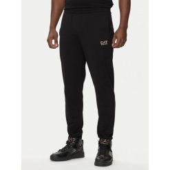 Spodnie dresowe męskie EA7 Emporio Armani sportowe treningowe czarne. Czarne spodnie sportowe męskie EA7, na lato, m, bez wzorów, z dresówki, trekkingowe. Za 319.00 zł.