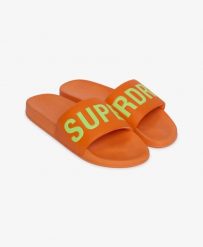 Superdry Klapki Pool z wyściełanym paskiem i formowaną wkładką – Orange Sorbet. Brązowe klapki męskie Superdry., z poliesteru, klasyczne. Za 129.40 zł.