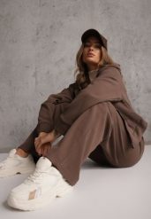 Brązowy Prążkowany Komplet Dresowy Spodnie o Szerokim Kroju i Bluza z Kapturem Rerih. Brązowe bluzy damskie Renee, l, bez wzorów, z dresówki, z kapturem. Za 169.99 zł.