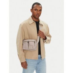 Saszetka Calvin Klein. Białe saszetki męskie Calvin Klein, młodzieżowe, małe. Za 185.99 zł.