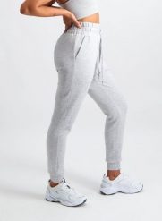 Damskie spodnie dresowe z modalem, wysoki stan, luźny krój Comfy jasnoszary. Szare spodnie sportowe damskie Aim'n, l, bez wzorów, z dresówki, na fitness i siłownię. Za 219.70 zł.