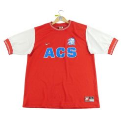 Second life - Męska koszulka futbolowa z USA - Stan dobry. Czerwone koszulki sportowe męskie Nike, m, bez wzorów, bez kołnierzyka, bez ramiączek, do piłki nożnej. Za 135.32 zł.