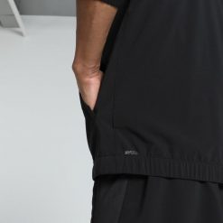 Męska kurtka do biegania VELOCITY PUMA Black. Czarne kurtki męskie Puma, m, bez wzorów, sportowe, bez kaptura. Za 254.50 zł.