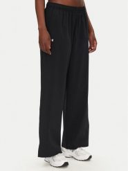 Under Armour Spodnie dresowe Rival 1386453 Czarny Wide Leg. Czarne spodnie dresowe damskie Under Armour, m, bez wzorów, z dresówki. Za 149.99 zł.