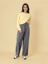 Spodnie materiałowe z szeroką nogawką - szary. Szare spodnie materiałowe damskie Sinsay, l, bez wzorów, z materiału. Za 59.99 zł.