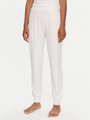 Guess Spodnie piżamowe O3BB00 KBXB2 Szary Regular Fit. Szare piżamy damskie Guess, s, z aplikacjami, z syntetyku, bez ramiączek. Za 129.99 zł.