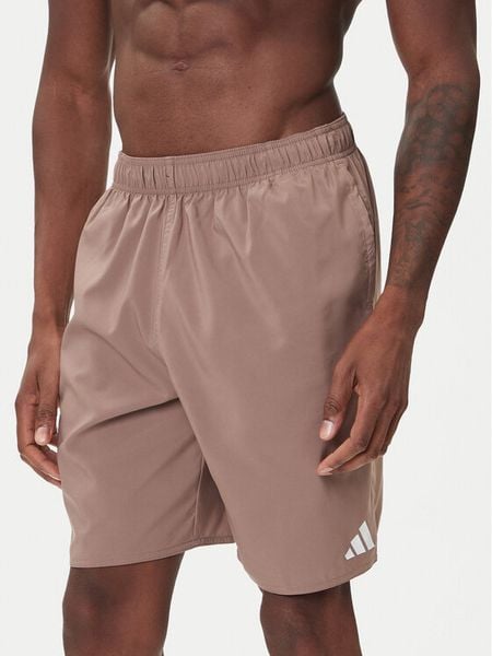 Adidas Szorty kąpielowe JX8758 Beżowy Regular Fit. Brązowe krótkie spodenki sportowe męskie Adidas, m, bez wzorów, z syntetyku, żeglarskie. Za 119.99 zł.