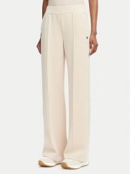 Guess Spodnie dresowe V6YB18 K4315 Beżowy Regular Fit. Brązowe spodnie dresowe damskie Guess, l, z aplikacjami, z dresówki. Za 394.99 zł.
