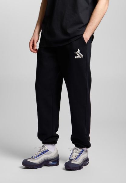 Spodnie dresowe męskie Prosto Crossing. Czarne spodnie sportowe męskie Prosto., m, z aplikacjami, z bawełny. Za 187.99 zł.