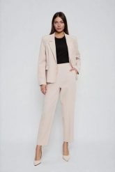 Spodnie cygaretki beżowe. Brązowe spodnie materiałowe damskie MOODO, l, bez wzorów, z elastanu. Za 149.99 zł.