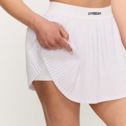 Spódnico-spodenki damskie fitness plisowane białe Varsity. Białe szorty sportowe damskie GYMBEAM, xl, bez wzorów, z bawełny, na fitness i siłownię. Za 113.90 zł.