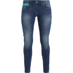 Dynafit Spodnie materiałowe jeans blue. Spodnie sportowe damskie Dynafit. Za 509.00 zł.