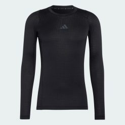 KOSZULKA Z DŁUGIM RĘKAWEM TECHFIT CLIMAWARM. Czarne koszulki sportowe męskie Adidas, l, bez wzorów, z elastanu, bez kołnierzyka, bez ramiączek, na fitness i siłownię, climawarm (adidas). Za 239.00 zł.
