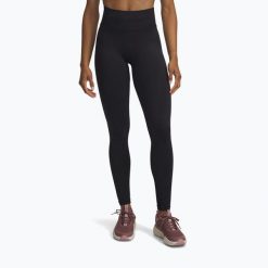 Legginsy Under Armour Project Rock. Czarne legginsy damskie Under Armour, bez wzorów, na fitness i siłownię. Za 209.99 zł.
