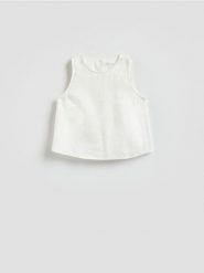 Lniana bluzka - złamana biel. Bluzki damskie Reserved, l, bez wzorów, bez kołnierzyka, bez ramiączek. Za 99.99 zł.