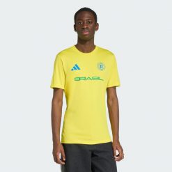 Koszulka Mistrzostwa Świata FIFA 26 Brazylia. Żółte koszulki sportowe męskie Adidas, l, bez wzorów, z materiału, bez kołnierzyka, bez ramiączek, do piłki nożnej. Za 149.00 zł.