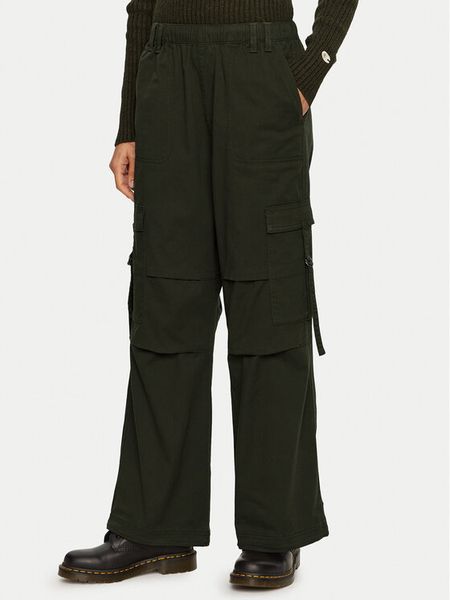 Champion Spodnie dresowe 117503 Zielony Oversize. Zielone spodnie dresowe damskie Champion, xs, bez wzorów, z bawełny. Za 199.99 zł.