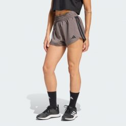 Szorty treningowe Pacer Workout Woven High Rise. Brązowe obuwie sportowe damskie Adidas, bez wzorów, na fitness i siłownię. Za 149.00 zł.