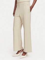 Calvin Klein Spodnie materiałowe LV044G210G Beżowy Wide Leg. Brązowe spodnie materiałowe damskie Calvin Klein, l, bez wzorów, z materiału. Za 359.99 zł.