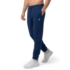 Męskie spodnie tenisowe Siroko Topspin Navy. Niebieskie spodnie sportowe męskie SIROKO, l, bez wzorów, z dresówki, na fitness i siłownię. Za 169.00 zł.
