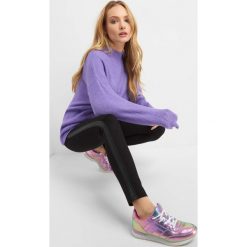 Tregginsy z lampasami. Legginsy damskie marki Orsay. Za 79.99 zł.