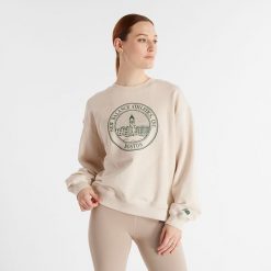 Bluza damska New Balance WT43553LIT – beżowa. Brązowe bluzy damskie New Balance, s, bez wzorów, z bawełny, bez kaptura. Za 199.99 zł.