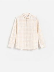 Bawełniana koszula regular fit - żółty. Żółte koszule męskie Reserved, l, bez wzorów, z bawełny, bez kołnierzyka, bez ramiączek. Za 119.99 zł.