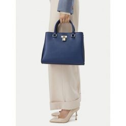 Torebka Nine West. Niebieskie torebki do ręki damskie Nine West, bez wzorów, bez dodatków. Za 299.99 zł.