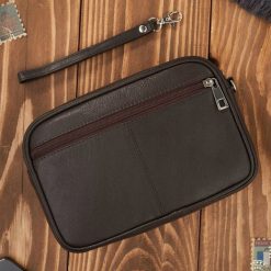 Paolo Peruzzi Saszetka męska do ręki skórzana dwukomorowa brązowa T-131-BR. Brązowe saszetki męskie Paolo Peruzzi. Za 186.65 zł.