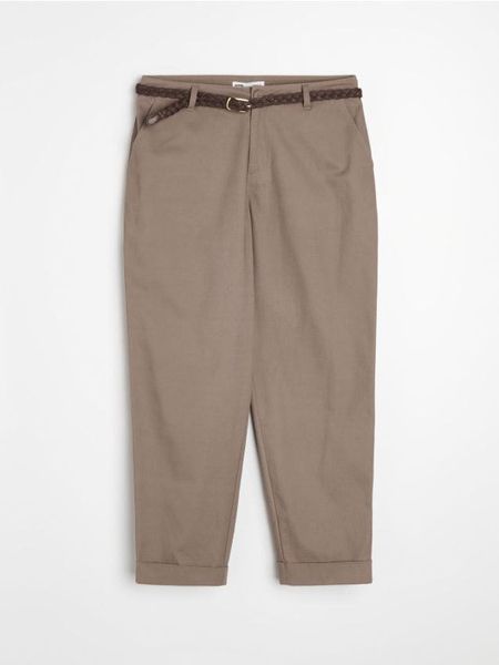 Bawełniane spodnie chino - beżowy. Brązowe spodnie materiałowe damskie Sinsay, l, bez wzorów, z bawełny. Za 59.99 zł.