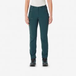 Spodnie turystyczne damskie Quechua MH500. Niebieskie spodnie sportowe damskie QUECHUA, l, bez wzorów, z bawełny, trekkingowe. Za 149.99 zł.