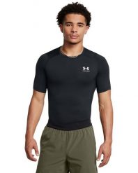 Under Armour UA HG ARMOUR COMP SS Koszulka treningowa męska. Szare koszulki sportowe męskie Under Armour, m, bez wzorów, z materiału, bez kołnierzyka, bez ramiączek, na fitness i siłownię. Za 109.99 zł.