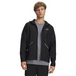 Under Armour UNSTOPPABLE WOVEN JACKET Kurtka męska. Czarne kurtki męskie Under Armour, l, bez wzorów, z poliesteru, sportowe, bez kaptura. Za 299.99 zł.