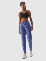 4F Spodnie treningowe szybkoschnące damskie - granatowe XL. Niebieskie spodnie sportowe damskie 4f, l, bez wzorów, z dzianiny, do biegania. W wyprzedaży za 99.99 zł.