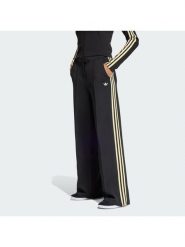 Adidas Spodnie materiałowe Sport Tailored KD2963 Czarny Wide Leg. Czarne spodnie sportowe damskie Adidas, bez wzorów, z materiału. Za 349.99 zł.