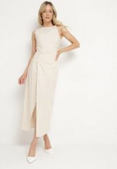 Jasnobeżowa Sukienka Dopasowana z Bawełną i Wiskozą z Rozcięciem Turilia. Brązowe sukienki damskie Born2be, na co dzień, m, bez wzorów, z bawełny, eleganckie, bez kołnierzyka, bez ramiączek, maxi, dopasowane. Za 99.99 zł.