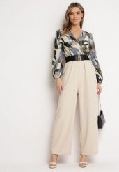Beżowy Kombinezon z Kopertową Górą i Szerokimi Spodniami oraz Paskiem Elavina. Brązowe sukienki damskie Born2be, l, bez wzorów, eleganckie, bez kołnierzyka, bez ramiączek, kopertowe. Za 109.99 zł.