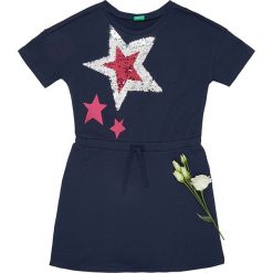 Sukienka w kolorze granatowym. Niebieskie sukienki niemowlęce Benetton Kids, bez wzorów, bez ramiączek. W wyprzedaży za 62.95 zł.