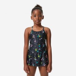 Strój jednoczęściowy pływacki dla dzieci Decathlon Lila Star ze spódniczką. Czarne stroje kąpielowe dla dziewczynek Decathlon, bez wzorów, z elastanu. Za 69.99 zł.