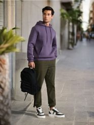 Spodnie jogger - zielony. Zielone spodnie materiałowe męskie Sinsay, m, bez wzorów, z bawełny. Za 49.99 zł.