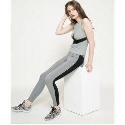 Nike - Legginsy. Legginsy sportowe damskie Nike, z bawełny. W wyprzedaży za 119.90 zł.