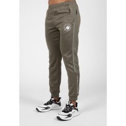 Broxton Track Spodnie - zielony. Zielone spodnie sportowe męskie GORILLA WEAR, m, bez wzorów, na fitness i siłownię. Za 276.00 zł.
