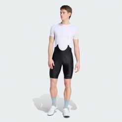 KOLARSKIE SPODENKI NA SZELKACH Z WKŁADKĄ ESSENTIALS TYPU CARGO. Czarne szorty męskie Adidas, m, bez wzorów, z elastanu. Za 569.00 zł.