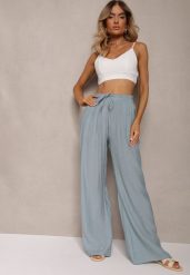 Jasnoniebieskie Szerokie Spodnie z Wiskozy i Gumką w Pasie Abyga. Niebieskie spodnie sportowe damskie Renee, l, bez wzorów, z jeansu, tenisowe. Za 79.99 zł.