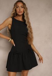 Czarna Sukienka Vices Drop Waist Bez Rękawów z Kokardkami i Falbanką Follena. Czarne sukienki damskie Renee, na co dzień, l, z aplikacjami, klasyczne, bez kołnierzyka, bez ramiączek, mini. Za 89.99 zł.