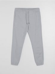 Bawełniane spodnie jogger - szary. Szare spodnie materiałowe męskie Sinsay, bez wzorów, z bawełny. Za 49.99 zł.