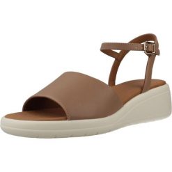 Sandały GEOX D MELICONIA Brązowy. Brązowe sandały damskie Geox, bez wzorów, z syntetyku, bez obcasa, bez zapięcia. Za 331.99 zł.