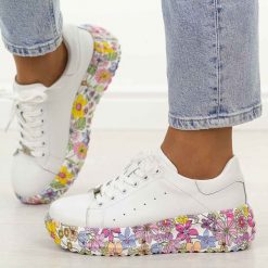 Białe skórzane sneakersy damskie na platformie Filippo Dp7507/26. Białe obuwie sportowe damskie Filippo, bez wzorów, z jeansu, trekkingowe. Za 239.00 zł.